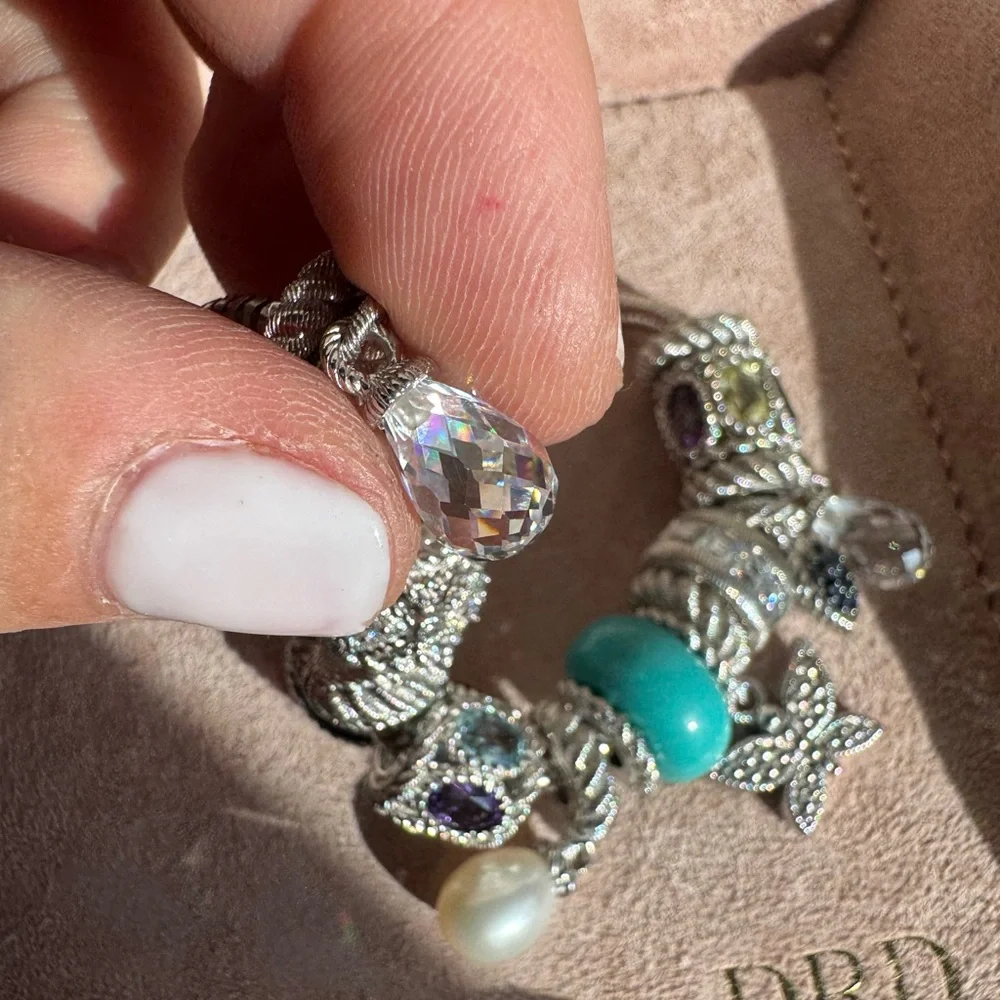 Judith Ripka Sterling Silver Charm bracelet with 13 charms and spacers - Picture 7 of 15